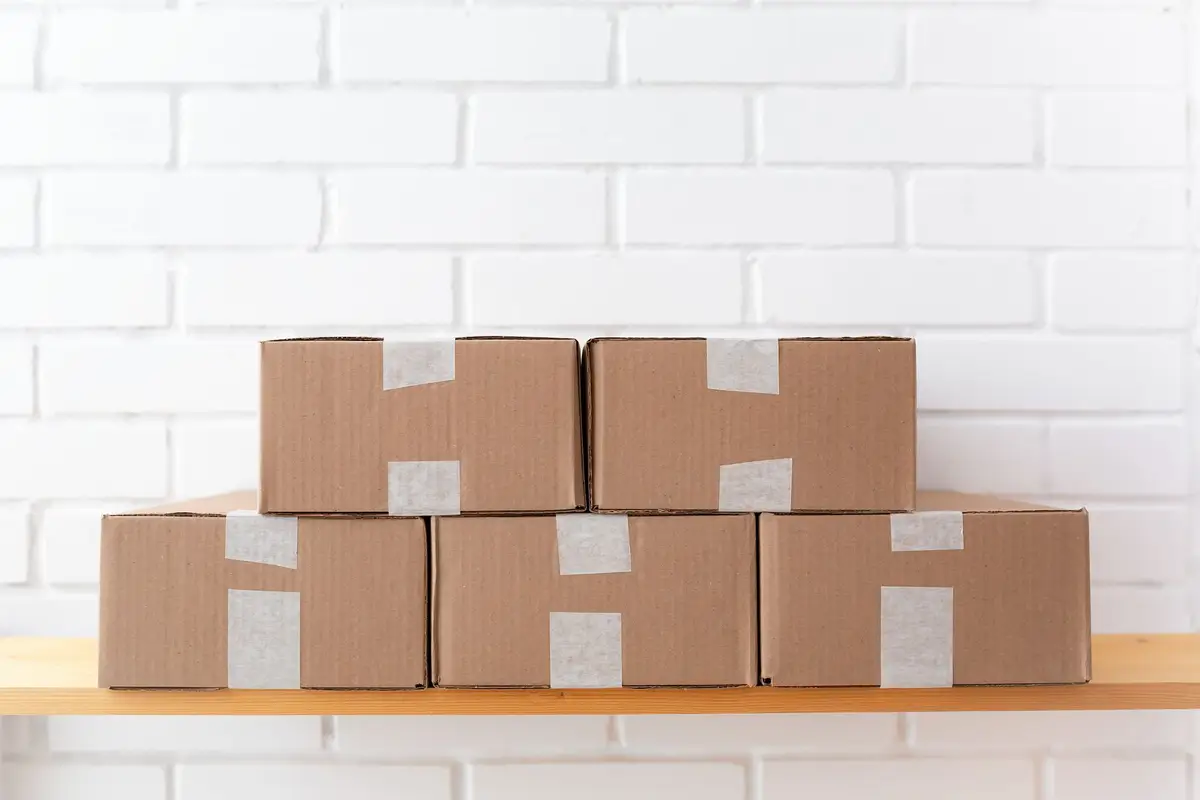 Stack of taped parcels ready to post