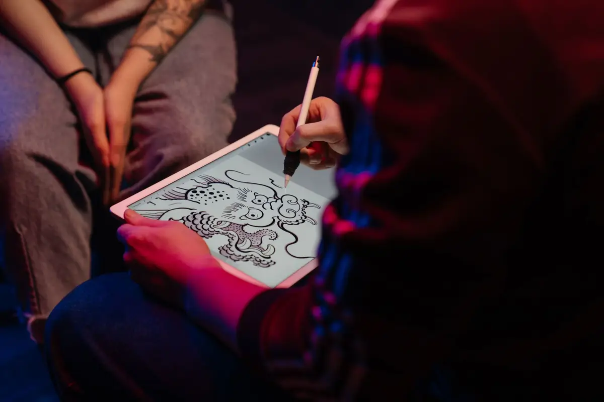 Artist drawing on a tablet