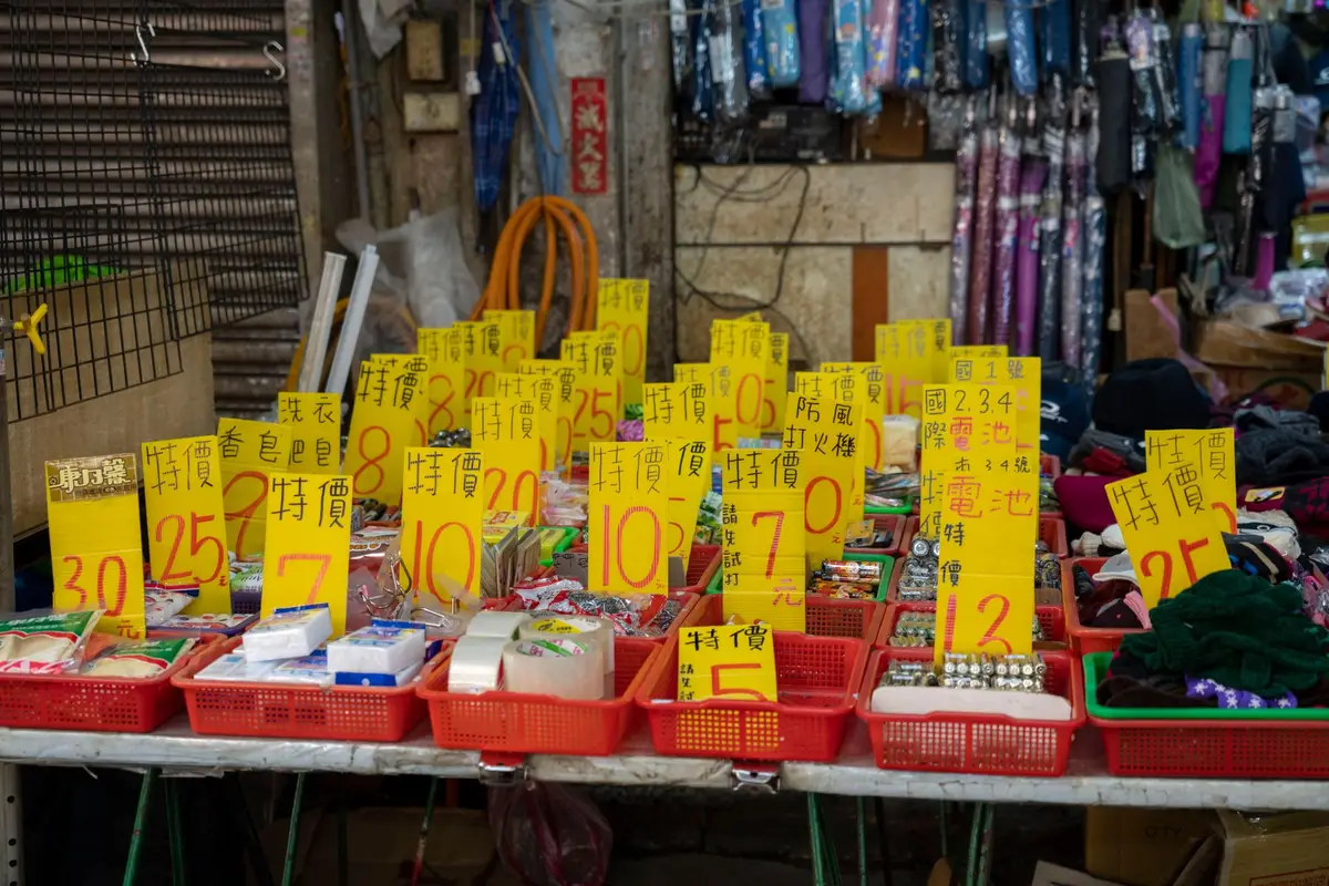Market stall with priced goods on display