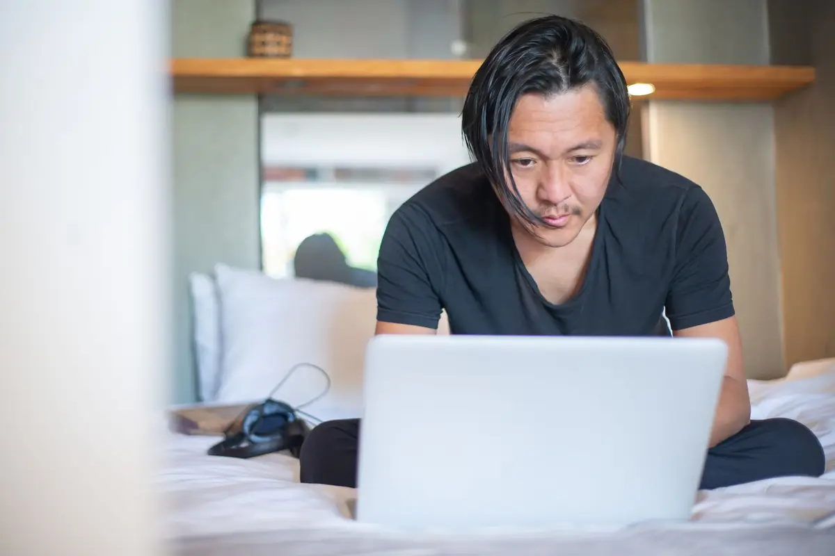 Freelancer working on a laptop at home